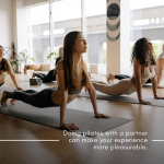 doing pilates with a partner can make your experience more pleasurable